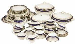 A Royal Worcester Regency pattern tea/dinner service with blue and gilt banded decoration,