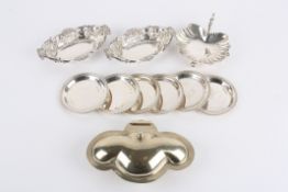 A Modern set of six silver coasters, Sheffield 1992 of circular form with beaded border, Carr's of