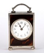 An Edwardian silver and tortoiseshell carriage clock, London 1918 of rectangular form with French