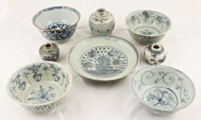A collection of Chinese Swatow Ming dynasty blue and white pottery to include four scroll painted