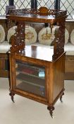 A Victorian walnut pierced music stand of rectangular form with pierced raised gallery rail upon