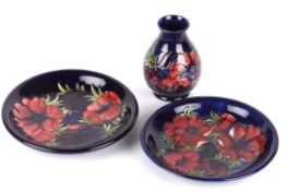 A pair of William Moorcroft Amemone pattern tube lined plates, circa 1994 of circular form with