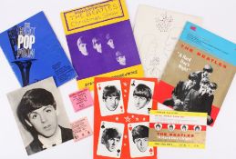 An interesting collection of five Beatles programmes together with three tickets and one photograph,