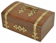 A late 19th century walnut veneered jewellery casket of slight domed top, with applied brass strap
