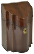 A Georgian mahogany knife box, converted into a letter holder, the hinged lid above a serpentine