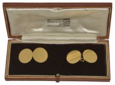 A pair of Art Deco simple polished circular 18ct gold cufflinks chain links and in associated red