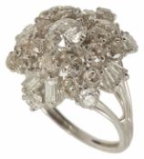 A large contemporary diamond set floral cluster dress ring the central diamond approx. 0.50ct,