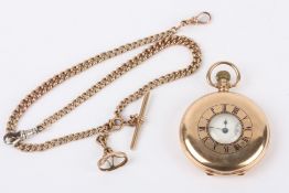An antique 9ct gold Waltham gentleman's half hunter pocket watch on 9ct gold chain the case