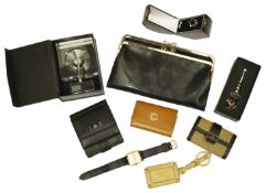A collection of Gucci and other designer leather and other items to include a black leather Gucci
