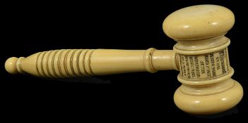 An ivory Gavel, 19th century of gavel form with turned handle, engraved 