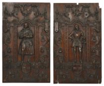 A pair of oak wall carvings, 19th century each of rectangular form with a central figure standing in