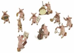 Franz Xaver Bergmann, (Austrian 1861 - 1936) a ten piece cold painted bronze band of pig