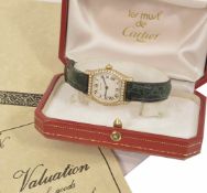A Cartier Tortue 18ct yellow gold and diamond Ladies wristwatch the champagne dial with roman