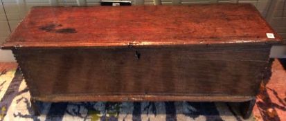 An oak sword chest, late 18th century of rectangular form, with hinged lid, above tapering sides