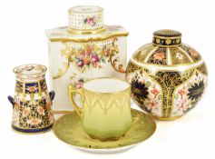 A Royal Crown Derby porcelain milk churn, circa 1913 typical twin handled form in Imari palette,