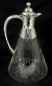 An Edwardian silver mounted glass claret jug, Birmingham 1904 the hinged lid with knopped finial,