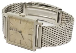 An Omega stainless steel gentleman's wristwatch the square white dial with baton hours with black