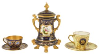 A Coalport twin handled vase with cover, late 19th/early 20th century, the gilt finial above blue