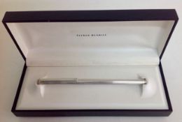 An Alfred Dunhill rollerball pen, silvered body, in original black box length: 14.1 cmCondition: