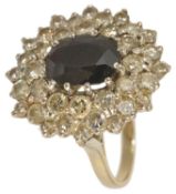 A large oval sapphire and diamond fancy cluster ring the central oval sapphire set within three rows