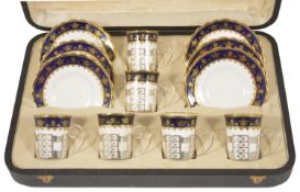 A George V suite of six Aynsley silver mounted coffee cans with saucers, Sheffield 1928 the coffee