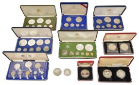 A collection of Franklin Mint and Royal Mint Coinage to include a cased set of 9 1976 Jamaica
