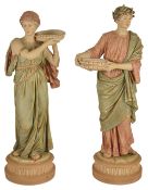 Two Royal Dux figurines, late 19th/early 20th century modelled as a female holding a circular dish