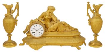 A French gilt metal garniture circa 1870 the bell striking Japy Freres movement, with enamel dial,