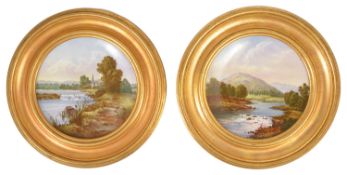 A pair of gilt framed Coalport plates, late 19th/early 20th century, of circular form with wavy edge
