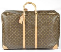 A Louis Vuitton Sirius 45 monogrammed canvas travel suitcase/bag, monogrammed canvas with tan