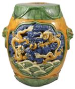A Oriental pottery polychrome painted garden seat, 20th century of cylindrical form with incised and