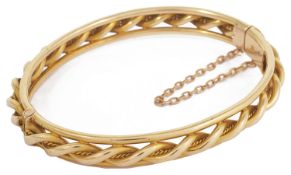 A Victorian 15ct gold rope twist bangle bangle of hinged construction with central rope twist with
