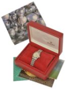 A Rolex Oyster Perpetual Datejust stainless steel ladies wristwatch the champagne dial with baton