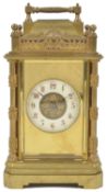 A French brass repeating carriage clock, circa 1890 with repeating movement, striking on a gong with