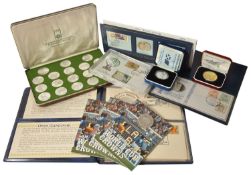 A selection of Sporting and Memorabilia Coins comprising of four 1982 Isle of Man Official World Cup