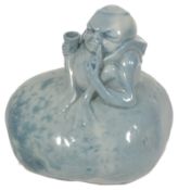 A Royal Doulton Titanian ware figure of a grotesque Imp, 20th century, in a mottled bluish colour,
