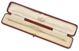 A fine Edwardian delicate diamond bracelet the central diamond approx. 0.50 ct of good quality and