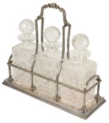 An impressive modern silver sectional decanter holder of Tantalus form, Sheffield 1999 with three