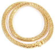 A contemporary 9ct gold mesh choker necklaceformed as a continuous woven mesh hollow tube with