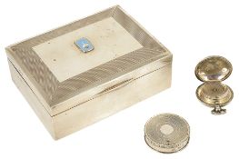 A silver cigarette boxthe rectangular engine turned decorated with hinged lid and wood lined