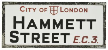 A City of London vitrolite opal glass street sign from Hammett Street E.C.3, circa 1936Hammett
