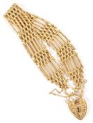 A good quality 9ct gold six bar gate bracelethaving 9ct gold heart padlock fastening with engraved