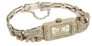 A Moviga ladies diamond set cocktail wristwatch, circa 1930'swith rectangular silvered dial, the