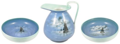 A Royal Doulton porcelain suite with yachting scenes,comprising two large wash bowls, each with