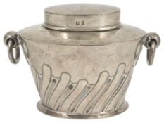 An Edwardian silver tea caddy, Birmingham 1905of oval partial fluted form with ring handles, by