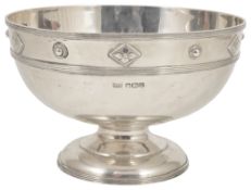 A George VI Arts and Crafts silver pedestal bowl, Sheffield 1937of circular form with applied bead