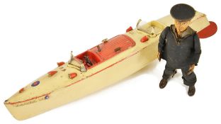 A Meccano Hornby Speedboat Racer IIIwith cream body and red trim, no key, factory label on body,