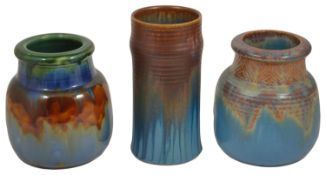 A selection of Bourne Denby pottery jars, mid 20th centurycomprising a cylindrical tall ribbed jar