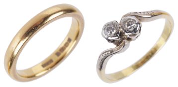 A 22ct gold wedding band together with a two stone diamond ring,