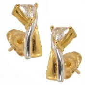 A pair of elegant contemporary triangular cut diamond set earrings